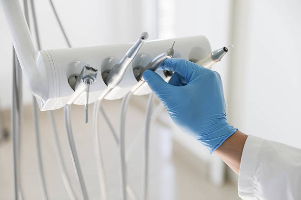 Professional Tooth Extraction technician working in Britt, IA